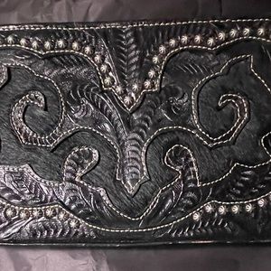 American West black leather clutch